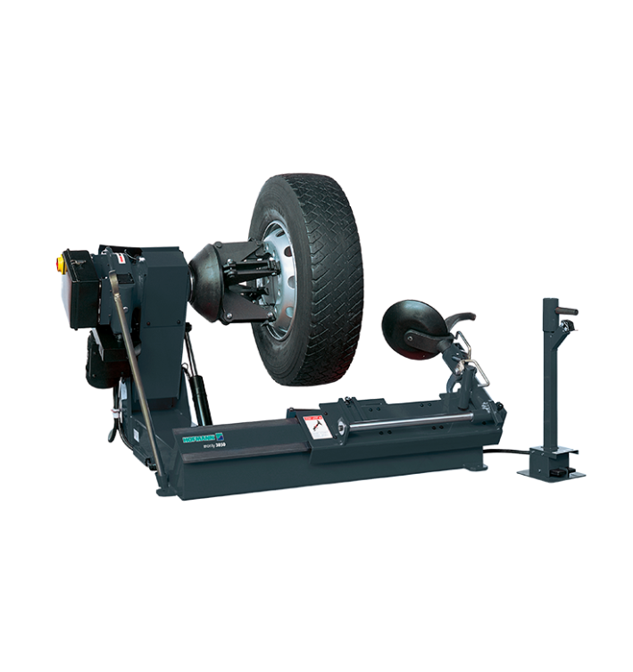 Hofmann Monty 3850 heavy-duty truck tire changer demonstrating its robust wheel changing mechanism.
