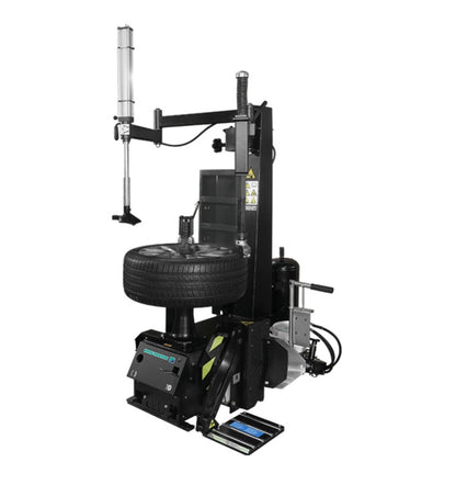 Hofmann Monty 8200S center-post tire changer with wheel mounting arm and control panel, used for automotive tire installation.